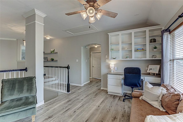 8002 Magic Mountain Cv, Round Rock, TX 78681 - office featuring a ceiling fan, light wood-style floors, built in desk, baseboards, and attic access