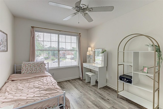 8002 Magic Mountain Cv, Round Rock, TX 78681 - bedroom with light wood-style flooring and a ceiling fan