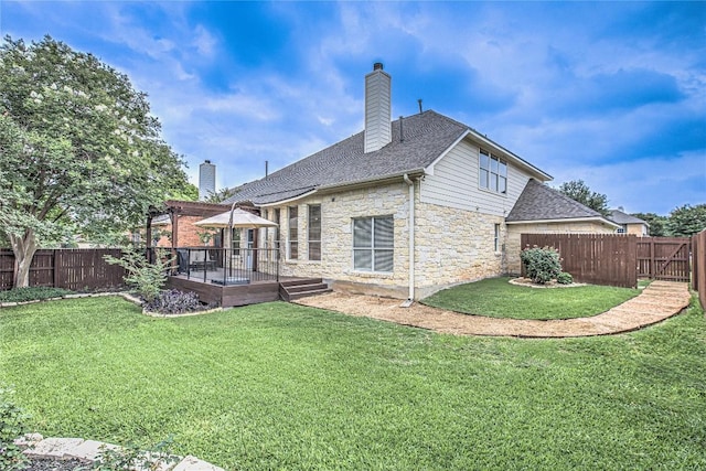 8002 Magic Mountain Cv, Round Rock, TX 78681 - back of house featuring stone siding, a fenced backyard, a deck, and a chimney
