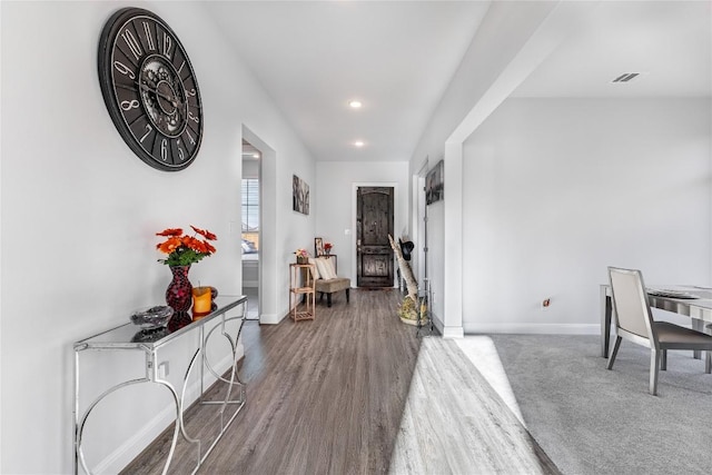 306 Pulitzer Dr, Hutto, TX 78634 - hallway with baseboards, recessed lighting, and wood finished floors