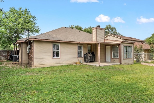 306 Southbrook Dr, Killeen, TX 76542 - back of property with a patio, a chimney, and cooling unit