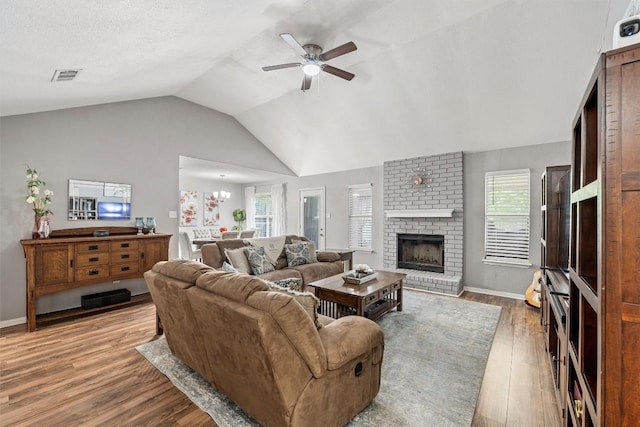 306 Southbrook Dr, Killeen, TX 76542 - living area featuring wood finished floors, a ceiling fan, healthy amount of natural light, and vaulted ceiling