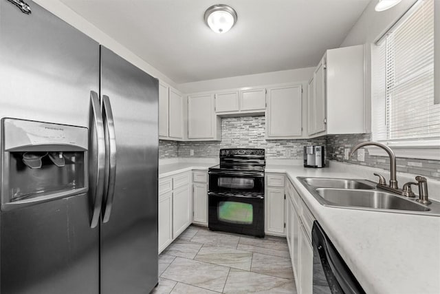 306 Southbrook Dr, Killeen, TX 76542 - kitchen with black appliances, a sink, light countertops, and backsplash