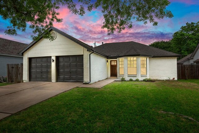 2310 Windsong Trl, Round Rock, TX 78664 - ranch-style house featuring brick siding, an attached garage, and concrete driveway