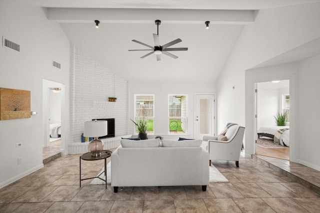 2310 Windsong Trl, Round Rock, TX 78664 - living room featuring high vaulted ceiling, a ceiling fan, baseboards, and beam ceiling