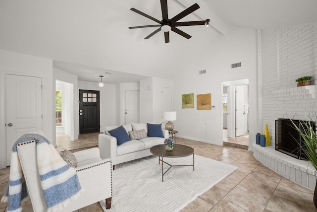 2310 Windsong Trl, Round Rock, TX 78664 - living area with ceiling fan, beamed ceiling, high vaulted ceiling, a fireplace, and baseboards