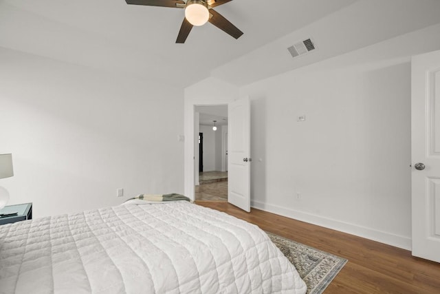 2310 Windsong Trl, Round Rock, TX 78664 - bedroom featuring wood finished floors, baseboards, and a ceiling fan