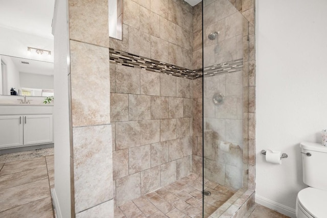 2310 Windsong Trl, Round Rock, TX 78664 - full bath featuring toilet, a tile shower, and vanity