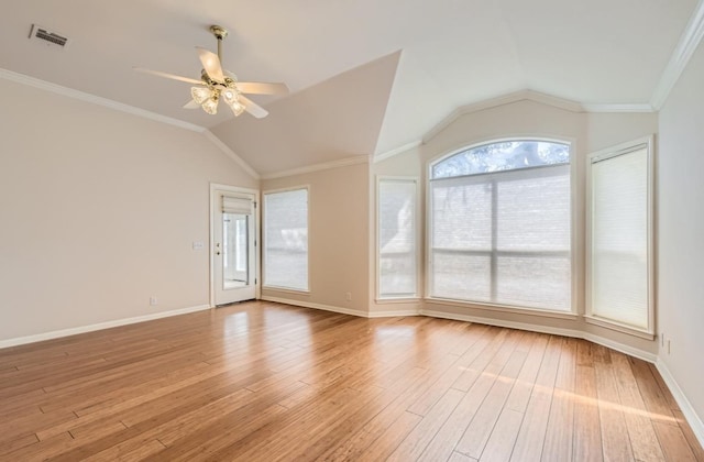 6901 W Bright Star Ln W, Austin, TX 78736 - empty room featuring lofted ceiling, a ceiling fan, light wood finished floors, plenty of natural light, and ornamental molding
