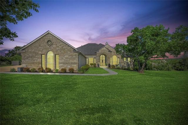 1701 Mira Vis, Leander, TX 78641 - french country inspired facade with stone siding and a lawn