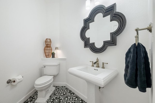 1701 Mira Vis, Leander, TX 78641 - bathroom with toilet and tile patterned floors