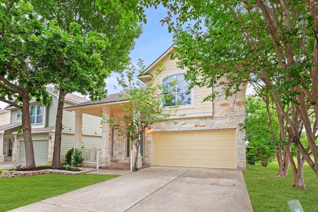 2100 Campfield Pkwy, Austin, TX 78745 - view of front of home with an attached garage, stone siding, concrete driveway, and a front yard