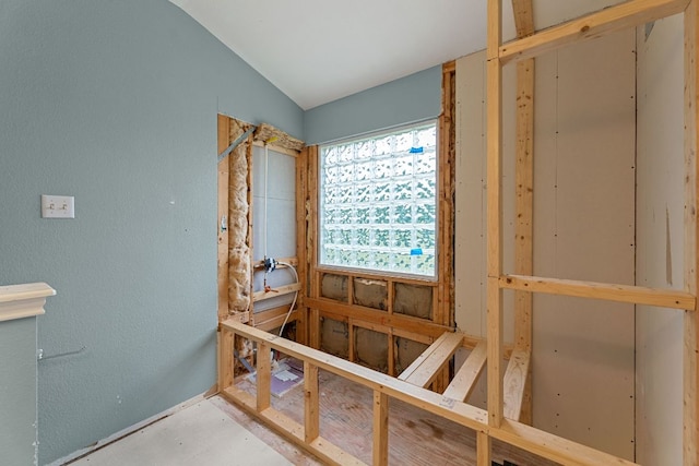 2100 Campfield Pkwy, Austin, TX 78745 - misc room with lofted ceiling and a textured wall