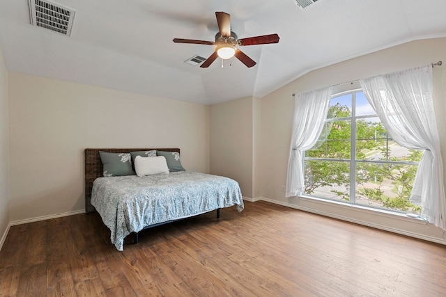 2100 Campfield Pkwy, Austin, TX 78745 - bedroom with vaulted ceiling, wood finished floors, and ceiling fan