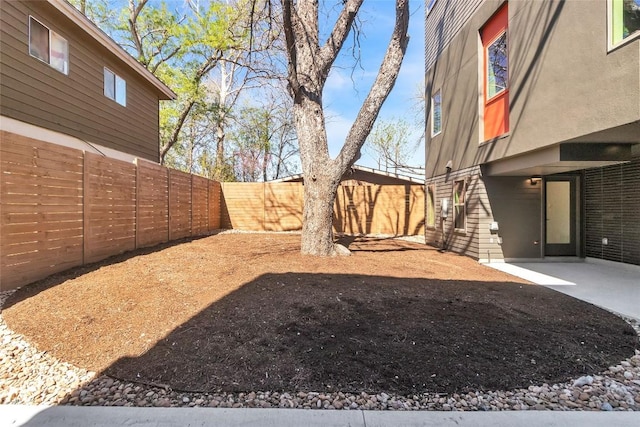 700 Denson Dr Unit 1104, Austin, TX 78752 - fenced backyard with a patio