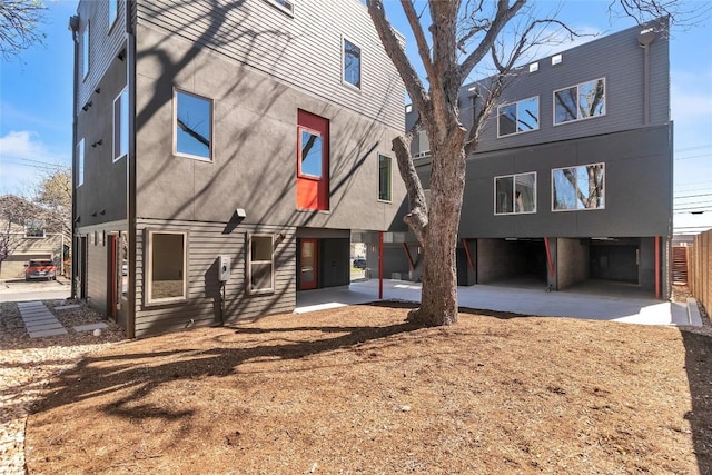 700 Denson Dr Unit 1104, Austin, TX 78752 - view of rear view of house