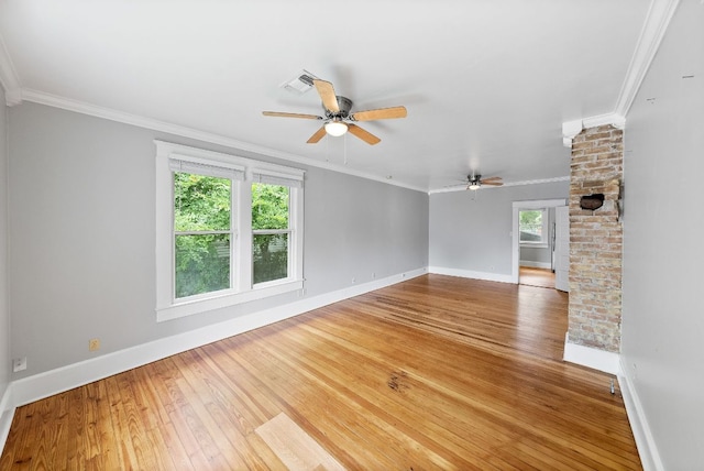 2032 E Cesar Chavez St, Austin, TX 78702 - spare room featuring a ceiling fan, hardwood / wood-style floors, baseboards, and ornamental molding