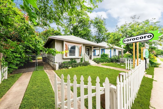 2032 E Cesar Chavez St, Austin, TX 78702 - view of front facade featuring a gate