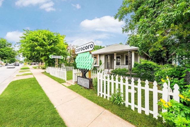 2032 E Cesar Chavez St, Austin, TX 78702 - view of front of house featuring covered porch