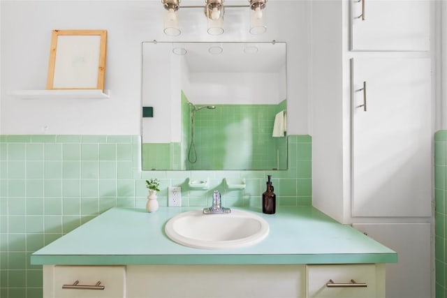 304 W Bee St, Lockhart, TX 78644 - bathroom featuring vanity and decorative backsplash