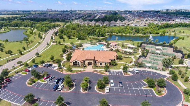 3227 Drago Dr, Round Rock, TX 78665 - aerial view of property and surrounding area featuring a nearby body of water and a pool area