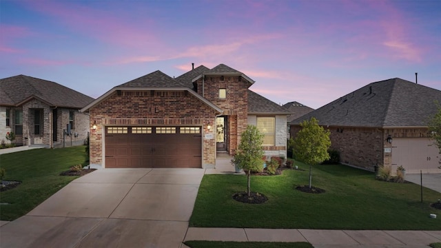 3227 Drago Dr, Round Rock, TX 78665 - french country style house featuring brick siding, driveway, a yard, and a garage