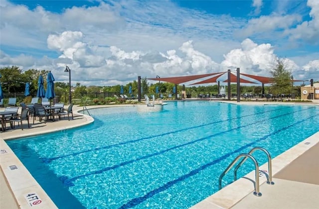 3227 Drago Dr, Round Rock, TX 78665 - community pool with a patio area