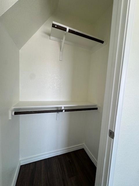 5511 Toledo Farm, San Antonio, TX 78222 - spacious closet with dark wood-type flooring