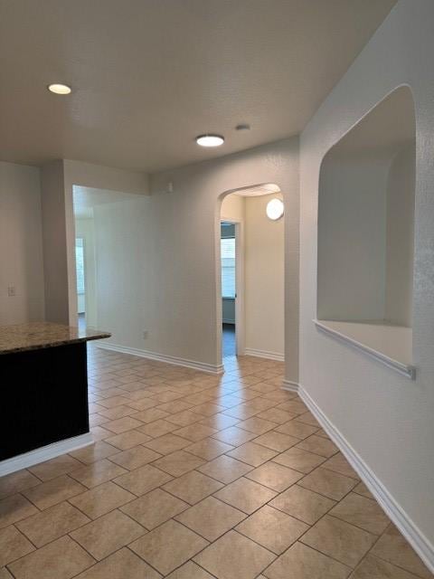 5511 Toledo Farm, San Antonio, TX 78222 - empty room with arched walkways, recessed lighting, and baseboards