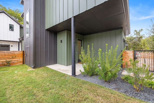 1711 E M Franklin Ave Unit 1, Austin, TX 78721 - view of property exterior featuring board and batten siding