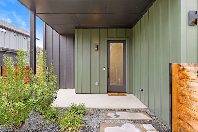 1711 E M Franklin Ave Unit 1, Austin, TX 78721 - property entrance with board and batten siding