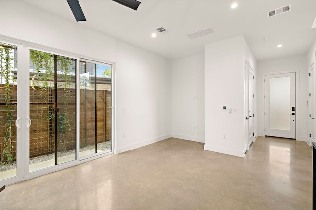 1711 E M Franklin Ave Unit 1, Austin, TX 78721 - spare room featuring finished concrete flooring, recessed lighting, and baseboards