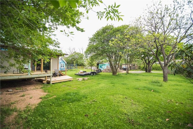 2713 Sweeney Ln, Austin, TX 78723 - view of yard featuring a wooden deck