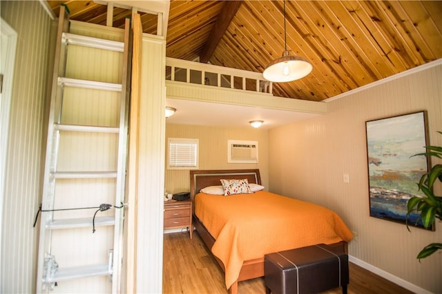 2713 Sweeney Ln, Austin, TX 78723 - bedroom featuring wooden ceiling, wood finished floors, a wall mounted air conditioner, vaulted ceiling, and baseboards