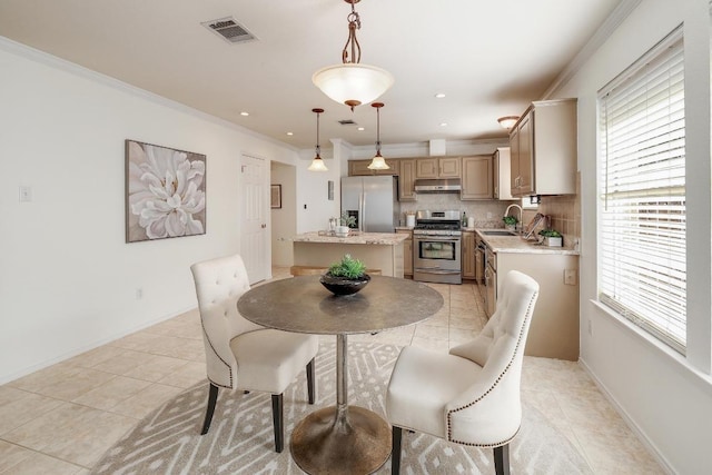 13413 Bolivia Dr, Austin, TX 78729 - dining room with light tile patterned floors, ornamental molding, recessed lighting, and baseboards