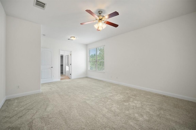 206 Skinner, Kyle, TX 78640 - empty room with light carpet, baseboards, and ceiling fan