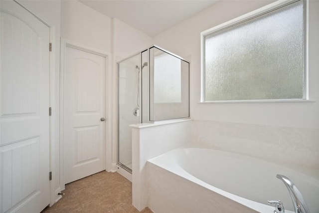 206 Skinner, Kyle, TX 78640 - full bathroom featuring a bath and a stall shower