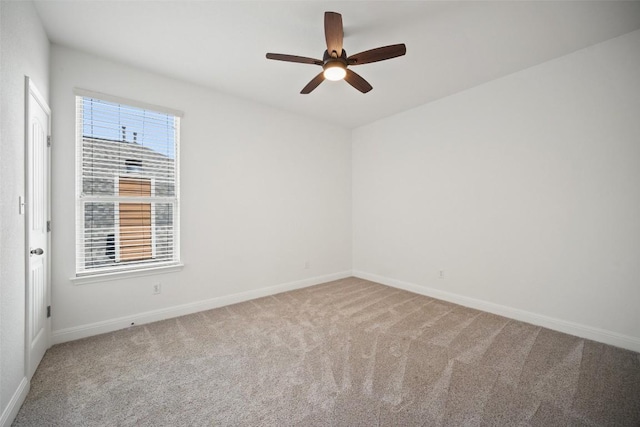 206 Skinner, Kyle, TX 78640 - unfurnished room with carpet floors, baseboards, and a ceiling fan