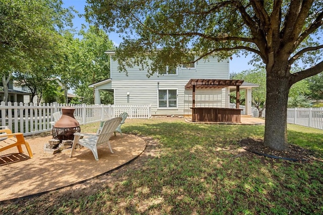 206 Skinner, Kyle, TX 78640 - back of house with a jacuzzi, an outdoor fire pit, a pergola, and a patio