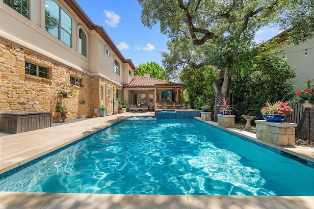 7 Sunview Rd, The Hills, TX 78738 - view of pool featuring a patio area and a pool with connected hot tub