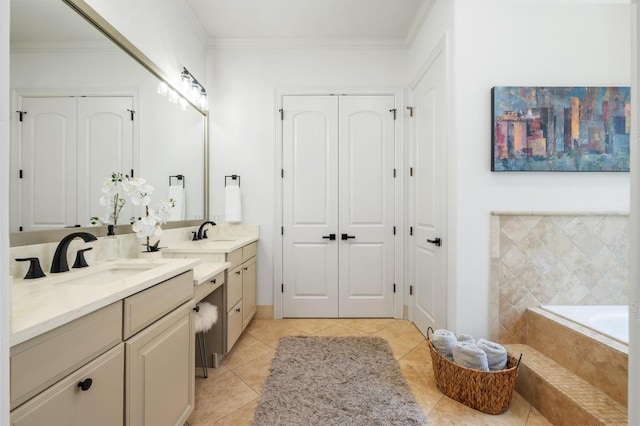 7 Sunview Rd, The Hills, TX 78738 - bathroom with ornamental molding, vanity, tiled tub, tile patterned floors, and a closet