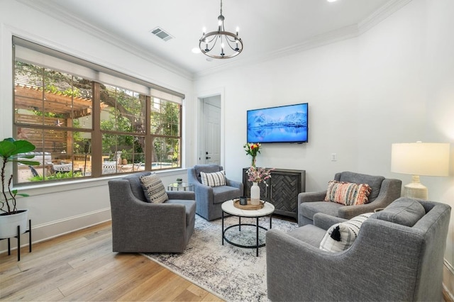 7 Sunview Rd, The Hills, TX 78738 - living room featuring a chandelier, wood finished floors, ornamental molding, baseboards, and recessed lighting