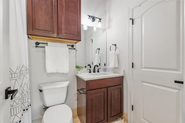 7 Sunview Rd, The Hills, TX 78738 - bathroom featuring vanity and toilet