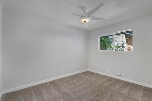 902 Acorn Oaks Dr, Austin, TX 78745 - carpeted spare room with baseboards and a ceiling fan