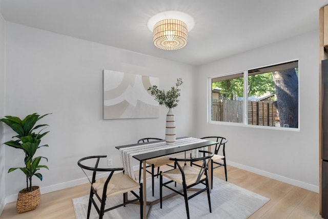 902 Acorn Oaks Dr, Austin, TX 78745 - dining space with light wood-style flooring