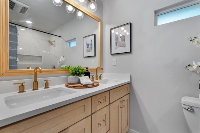 902 Acorn Oaks Dr, Austin, TX 78745 - full bathroom with a marble finish shower and double vanity