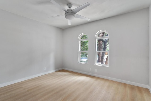 902 Acorn Oaks Dr, Austin, TX 78745 - spare room with wood finished floors and a ceiling fan