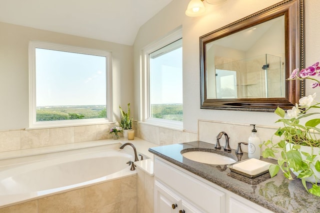 5801 Fox Chapel Dr, Austin, TX 78746 - bathroom featuring vanity, a bath, lofted ceiling, and tiled shower