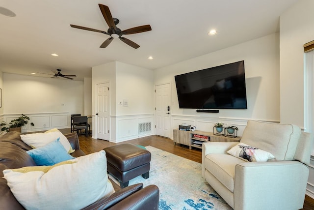 5801 Fox Chapel Dr, Austin, TX 78746 - living room with ceiling fan, recessed lighting, a decorative wall, wood finished floors, and a wainscoted wall
