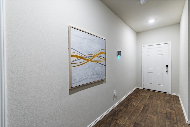 6100 Shanjia Dr, Austin, TX 78724 - entryway with dark wood finished floors and baseboards